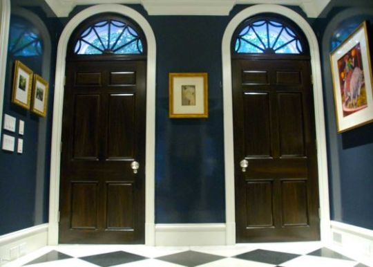 Navy wall with a glossy finish